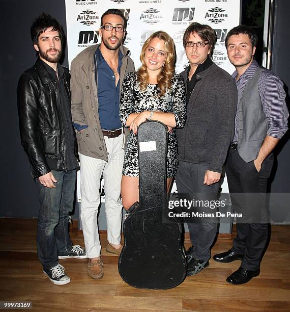 Michelle Edgar and Saen Fitzgerald, Julio Tavarez, Cliff Sarcona and Dan Nigro of As Tall As Lions perform during the first anniversary presentation...