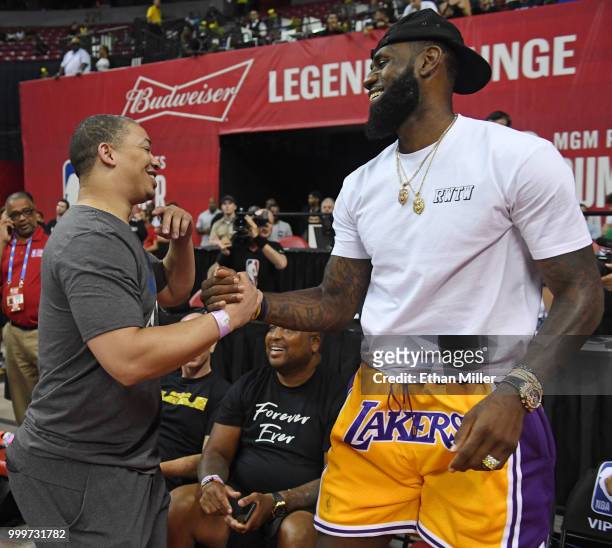 Head coach Tyronn Lue of the Cleveland Cavaliers greets LeBron James of the Los Angeles Lakers after a quarterfinal game of the 2018 NBA Summer...