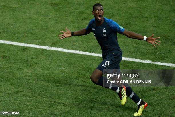 France's midfielder Paul Pogba celebrates after scoring a goal during the Russia 2018 World Cup final football match between France and Croatia at...