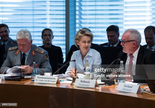 Minister of defence Ursula von der Leyen sits next to general inspector of the German Military, Volker Wieker and chairman of the committee Wolfgang...