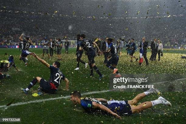 France's players celebrate after winning the Russia 2018 World Cup final football match between France and Croatia at the Luzhniki Stadium in Moscow...