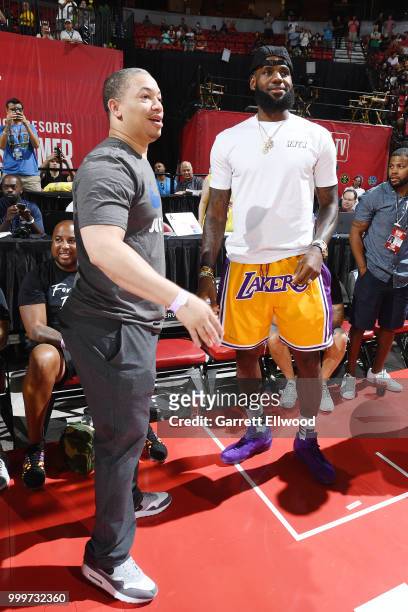 Head Coach Tyronn Lue of the Cleveland Cavaliers speaks with LeBron James of the Los Angeles Lakers during the game against the Detroit Pistons...