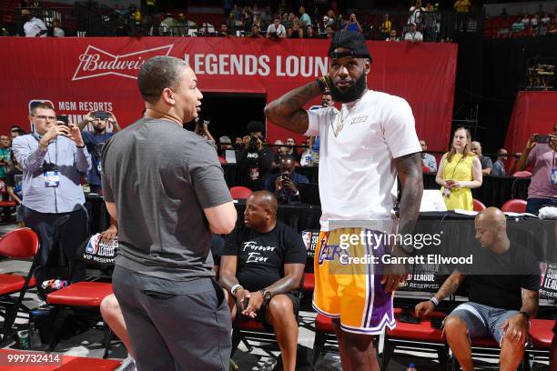 Head Coach Tyronn Lue of the Cleveland Cavaliers speaks with LeBron James of the Los Angeles Lakers during the game against the Detroit Pistons...
