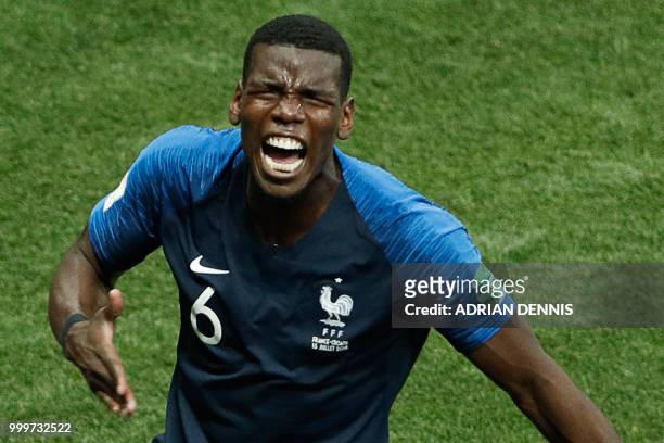 France's midfielder Paul Pogba celebrates after scoring a goal during the Russia 2018 World Cup final football match between France and Croatia at...