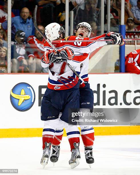David Savard celebrates the third period goal from Scott Brannon against the Windsor Spitfires during the 2010 Mastercard Memorial Cup Tournament at...