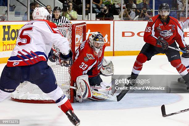 Philip Grubauer of the Windsor Spitfires stops the puck on a shot by Marek Hrivik of the Moncton Wildcats during the 2010 Mastercard Memorial Cup...