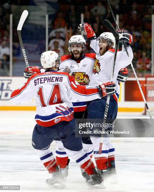 Ted Stephens and Mark Barberio celebrate the third period goal from team mate Brandon Gormley of the Moncton Wildcats during the 2010 Mastercard...