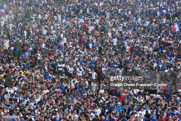 View of the massive number of French fans watching the World Cup final against Croatia, on July 15, 2018 in the Champs de Mars, near the Eiffel Tower...