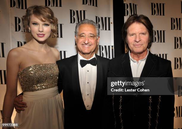 Musician Taylor Swift, musician John Fogerty and BMI President and CEO Del Bryant attend the 58th Annual BMI Pop Awards held at the Beverly Wilshire...