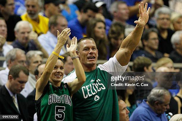 Pro Wrestler John Cena cheeers for the Boston Celtics against of the Orlando Magic in Game Two of the Eastern Conference Finals during the 2010 NBA...