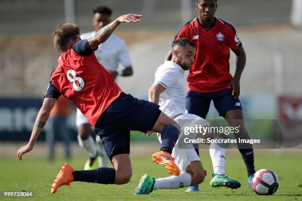 Miguel Angelo da Silva Rocha Zeka of Lille, Marvin Martin of Reims during the Club Friendly match between Lille v Reims at the Stade Paul Debresie on...