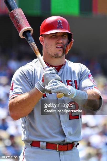 Los Angeles Angels center fielder Mike Trout looks on from the batting circle during a MLB game between the Los Angeles Angels of Anaheim and the Los...
