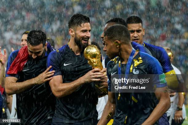 Olivier Giroud of France celebrates with the trophy after the 2018 FIFA World Cup Russia Final between France and Croatia at Luzhniki Stadium on July...