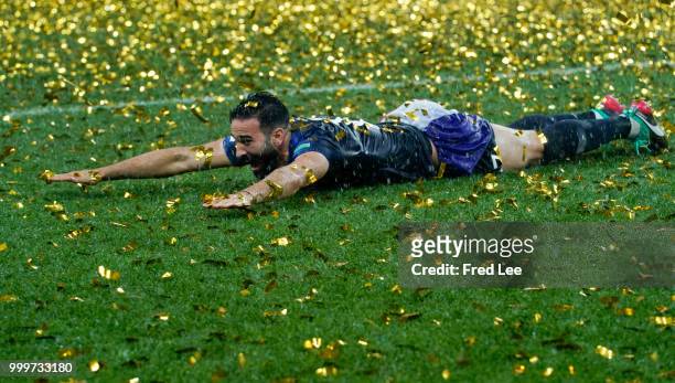 Adil Rami of France celebrates with the trophy after the 2018 FIFA World Cup Russia Final between France and Croatia at Luzhniki Stadium on July 15,...