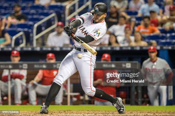 Miami Marlins pinch hitter Pablo Lopez singles for his first major league baseball career hit against the Philadelphia Phillies on Sunday, July 15,...