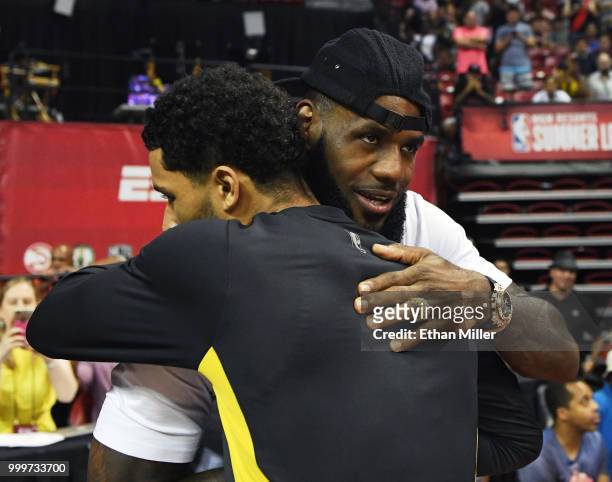 LeBron James of the Los Angeles Lakers hugs Josh Hart of the Lakers after he played in a quarterfinal game of the 2018 NBA Summer League against the...