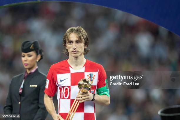 Luka Modric of Croatia walks off with the FIFA Golden Ball for player of the tournament at the end of the 2018 FIFA World Cup Russia Final between...