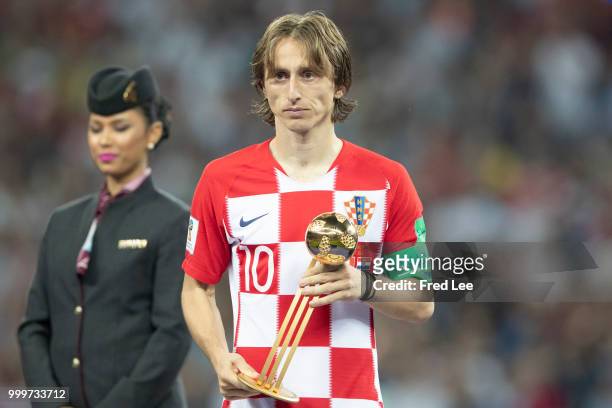 Luka Modric of Croatia walks off with the FIFA Golden Ball for player of the tournament at the end of the 2018 FIFA World Cup Russia Final between...