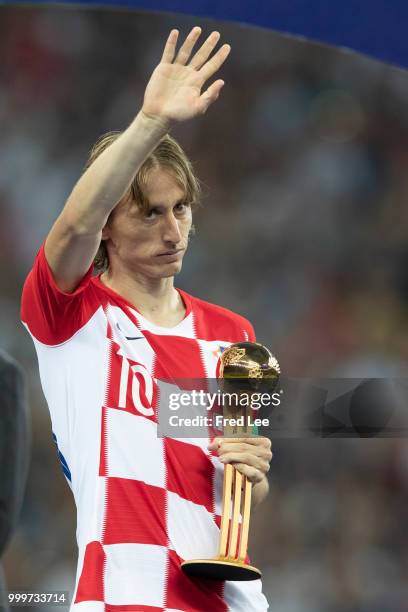 Luka Modric of Croatia walks off with the FIFA Golden Ball for player of the tournament at the end of the 2018 FIFA World Cup Russia Final between...