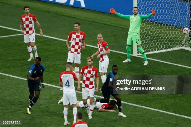 Croatia's goalkeeper Danijel Subasic reacts after Croatia's forward Mario Mandzukic headed the ball and scored an own goal during the Russia 2018...