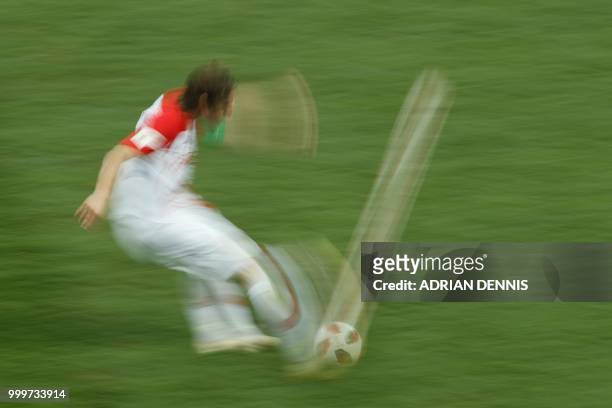 Croatia's midfielder Luka Modric shoots the ball during the Russia 2018 World Cup final football match between France and Croatia at the Luzhniki...