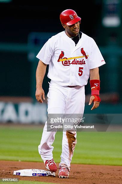 Albert Pujols of the St. Louis Cardinals reacts to being picked off at second base in action against the Washington Nationals at Busch Stadium on May...