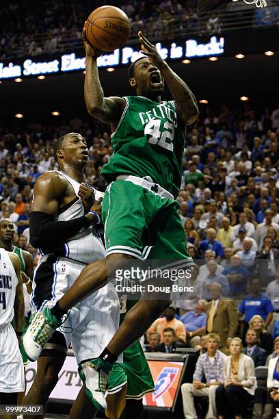 Tony Allen of the Boston Celtics drives for a shot attempt past Dwight Howard of the Orlando Magic in Game Two of the Eastern Conference Finals...