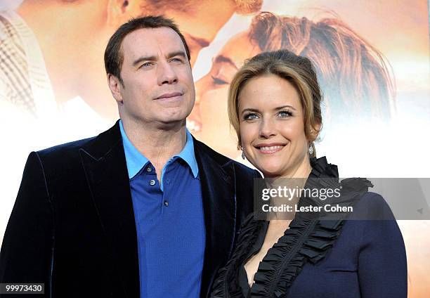 Actor John Travolta and wife actress Kelly Preston arrive at the "The Last Song" Los Angeles premiere held at ArcLight Hollywood on March 25, 2010 in...