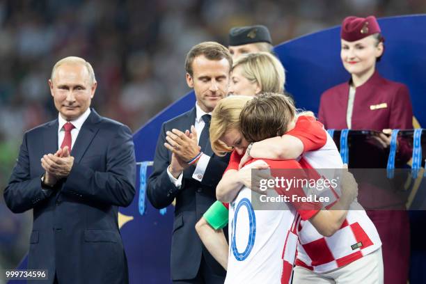 Luka Modric of Croatia embraces Kolinda Grabar-Kitarovic, President of Croatia after the 2018 FIFA World Cup Russia Final between France and Croatia...