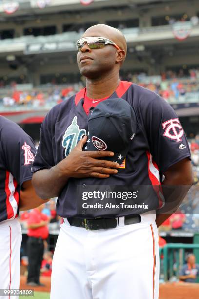 Torii Hunter of Team USA looks on during the singing of the national anthem prior to the SiriusXM All-Star Futures Game at Nationals Park on Sunday,...