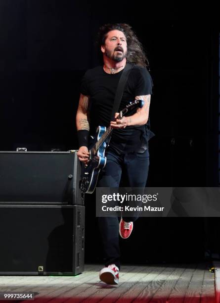 Dave Grohl of Foo Fighters performs on stage during their "Concrete and Gold" tour at Northwell Health at Jones Beach Theater on July 14, 2018 in...