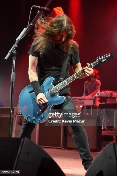 Dave Grohl of Foo Fighters performs on stage during their "Concrete and Gold" tour at Northwell Health at Jones Beach Theater on July 14, 2018 in...