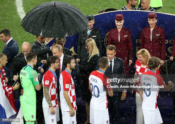 Russian President Vladimir Putin , French President Emmanuel Macron and FIFA President Gianni Infantino attend the award ceremony of the 2018 FIFA...