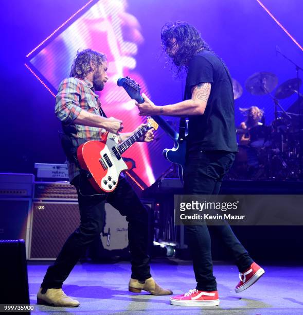 Chris Shiflett and Dave Grohl of Foo Fighters perform on stage during their "Concrete and Gold" tour at Northwell Health at Jones Beach Theater on...