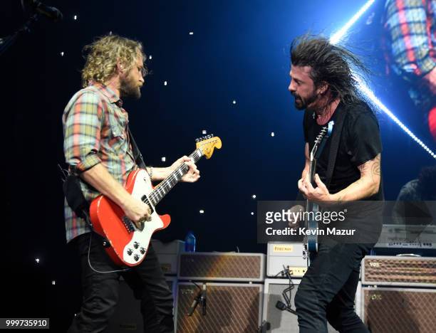 Chris Shiflett and Dave Grohl of Foo Fighters perform on stage during their "Concrete and Gold" tour at Northwell Health at Jones Beach Theater on...