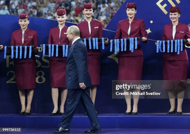 Russian President Vladimir Putin attends the 2018 FIFA World Cup Final Awarding Ceremony at Luzhniki Stadium in Moscow, Russia, July 2018. French and...