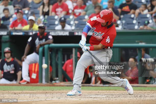 Keibert Ruiz of the Los Angeles Dodgers and the World Team bats against the U.S. Team during the SiriusXM All-Star Futures Game at Nationals Park on...