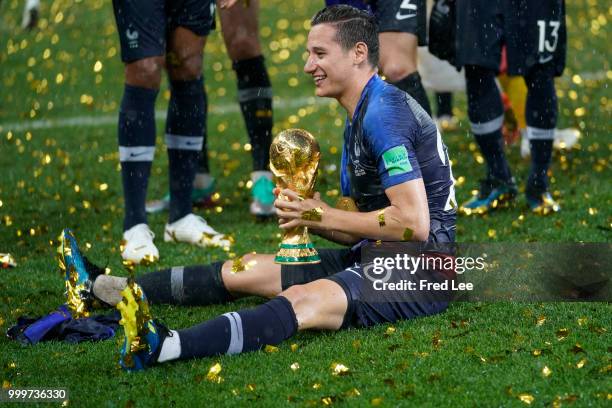 Florian Thauvin of France celebrates with the trophy after the 2018 FIFA World Cup Russia Final between France and Croatia at Luzhniki Stadium on...