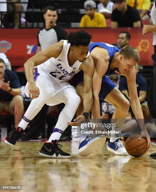 Johnathan Williams of the Los Angeles Lakers and Henry Ellenson of the Detroit Pistons go after a loose ball during a quarterfinal game of the 2018...