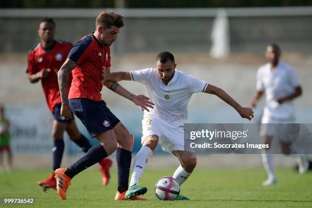 Miguel Angelo da Silva Rocha Zeka of Lille, Marvin Martin of Reims during the Club Friendly match between Lille v Reims at the Stade Paul Debresie on...