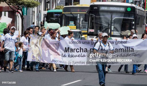 People march in favor of the traditional family in San Jose, on July 15, 2018.