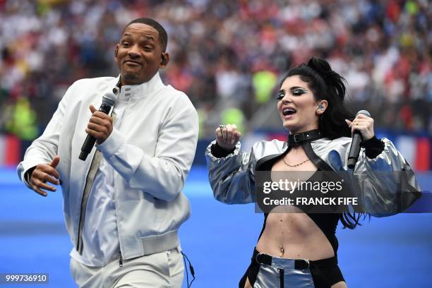 Actor Will Smith and Albanian singer Era Istrefi perform during the closing ceremony of the Russia 2018 World Cup ahead of the final football match...