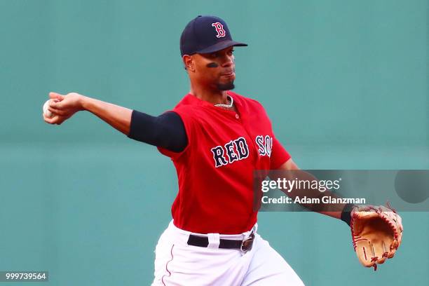 Xander Bogaerts of the Boston Red Sox fields a ground ball in the first inning of a game against the Toronto Blue Jays at Fenway Park on July 13,...