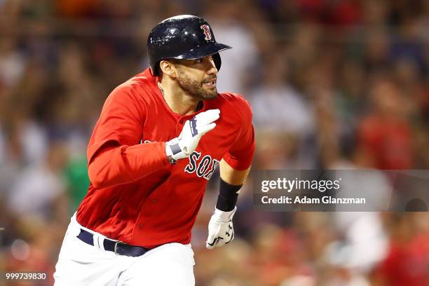 Martinez of the Boston Red Sox runs to first base in the fifth inning of a game against the Toronto Blue Jays at Fenway Park on July 13, 2018 in...