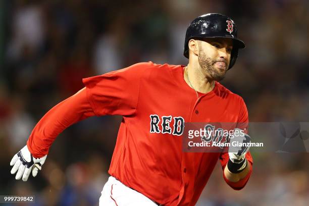 Martinez of the Boston Red Sox runs to first base in the fifth inning of a game against the Toronto Blue Jays at Fenway Park on July 13, 2018 in...