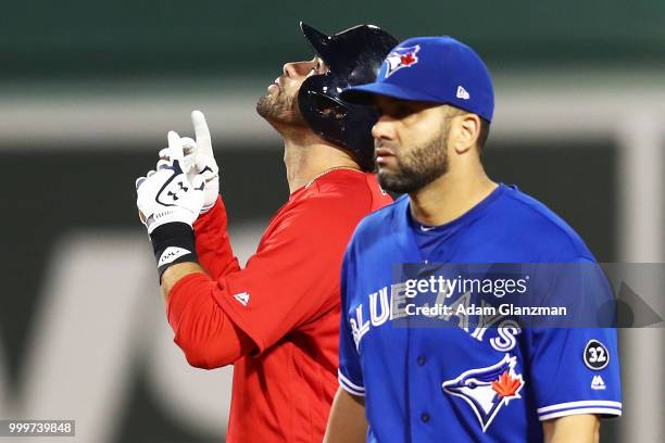 Martinez of the Boston Red Sox reacts after hitting a double in the fifth inning of a game against the Toronto Blue Jays at Fenway Park on July 13,...