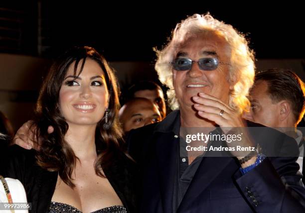 Elisabetta Gregoraci and Flavio Briatore attend the de Grisogono cocktail party at the Hotel Du Cap on May 18, 2010 in Cap D'Antibes, France.