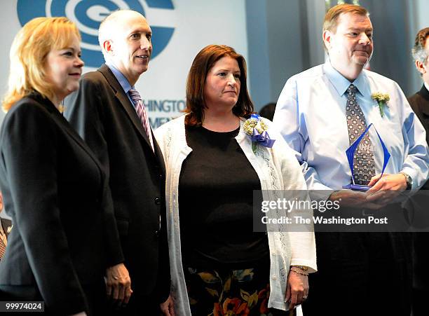 Loundoun County Foster Parents of the Year Roger and Rose Schaeffer posed for a photograph on April 29, 2010 in Washington DC. Posing with the...