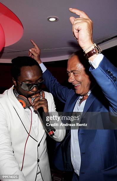 Will I am and Fawaz Gruosi attend the de Grisogono Party at the Hotel Du Cap on May 18, 2010 in Cap D'Antibes, France.