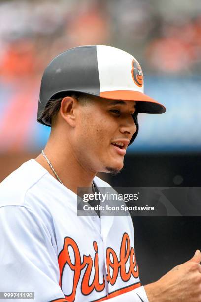 Baltimore Orioles shortstop Manny Machado stands on first base after a walk during the game between the Texas Rangers and the Baltimore Orioles on...